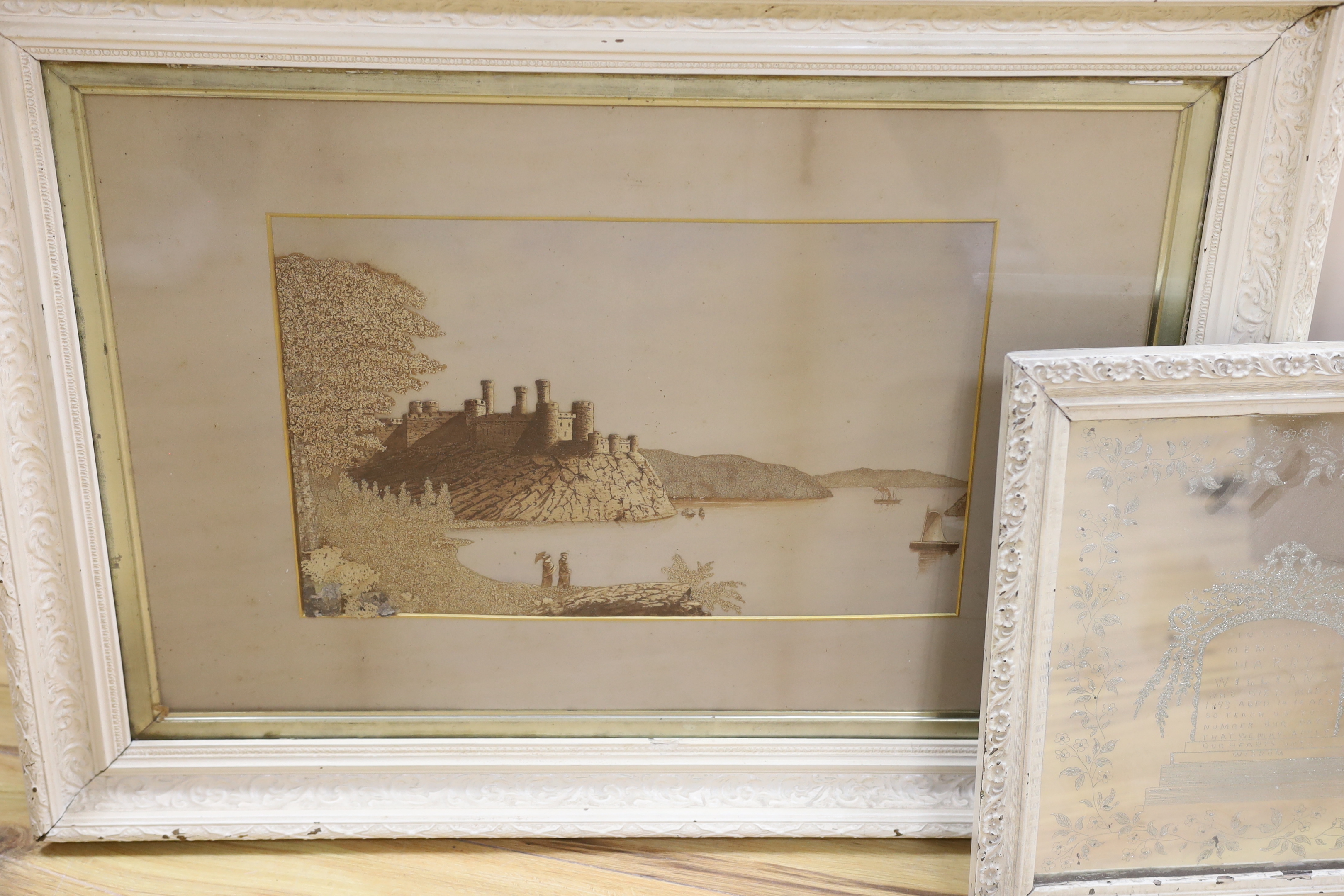 A cork picture and a Victorian engraved mirror, ‘In memory of Harry Williams, died 1893, aged fourteen’, largest 43 x 26cm